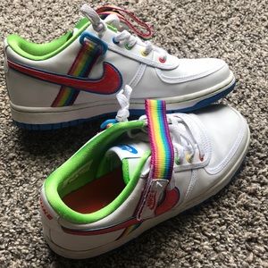 black nikes with rainbow bottom